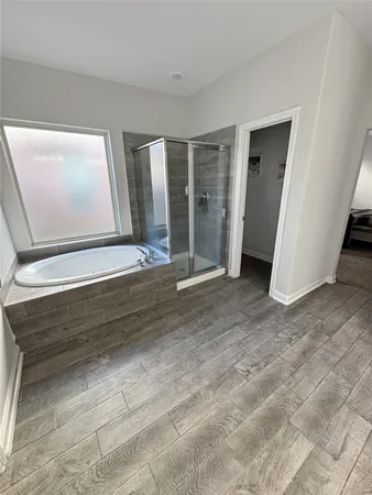 a view of an empty room with closet