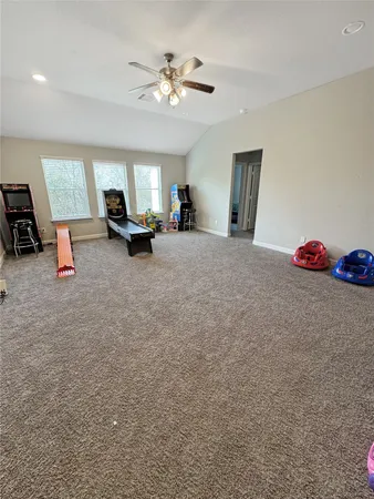 a view of livingroom with furniture and white walls