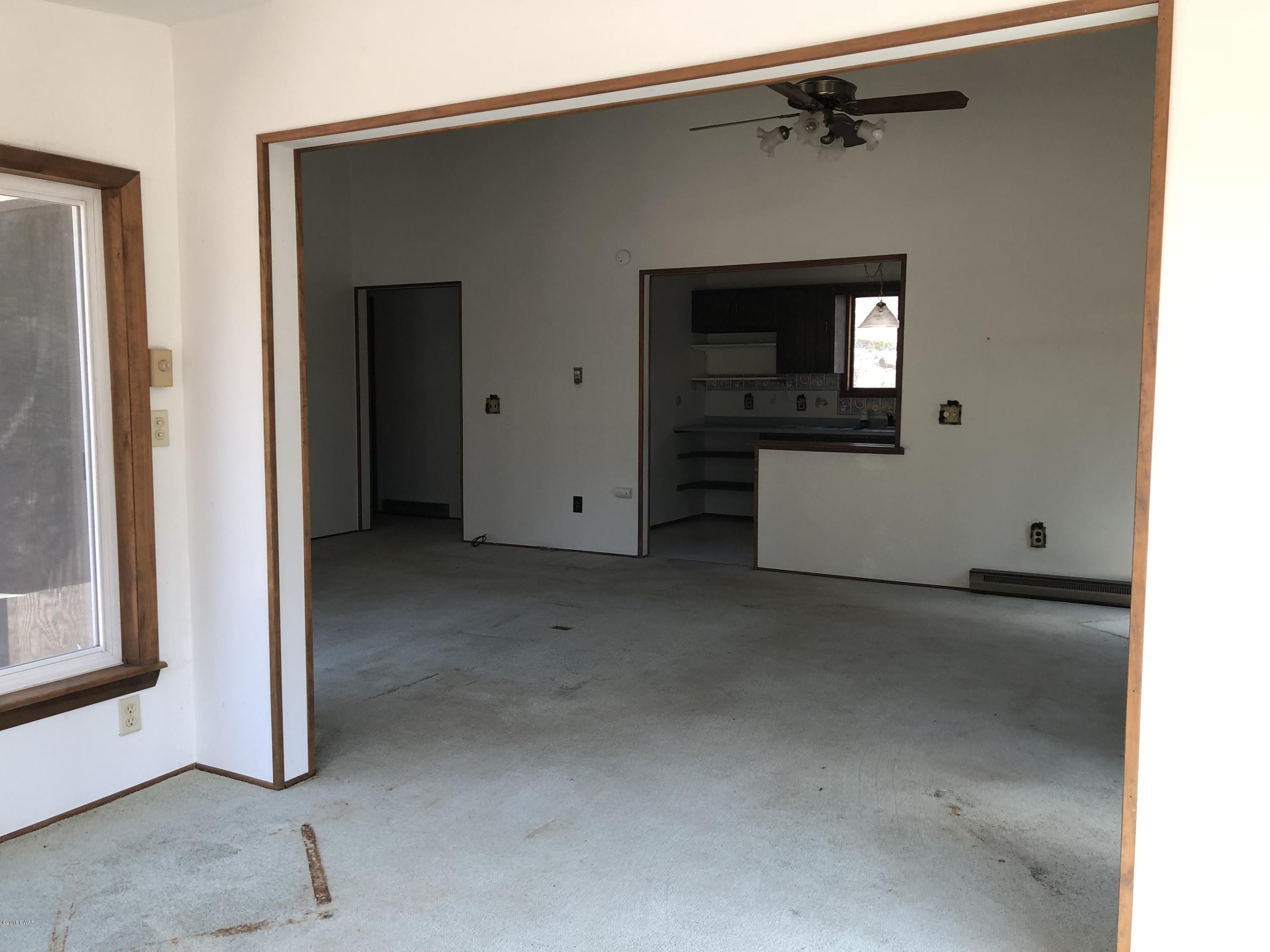 802 Conastoga Court Hawley, PA 18428 - Photo 10 of 37 11 living area from sunroom
