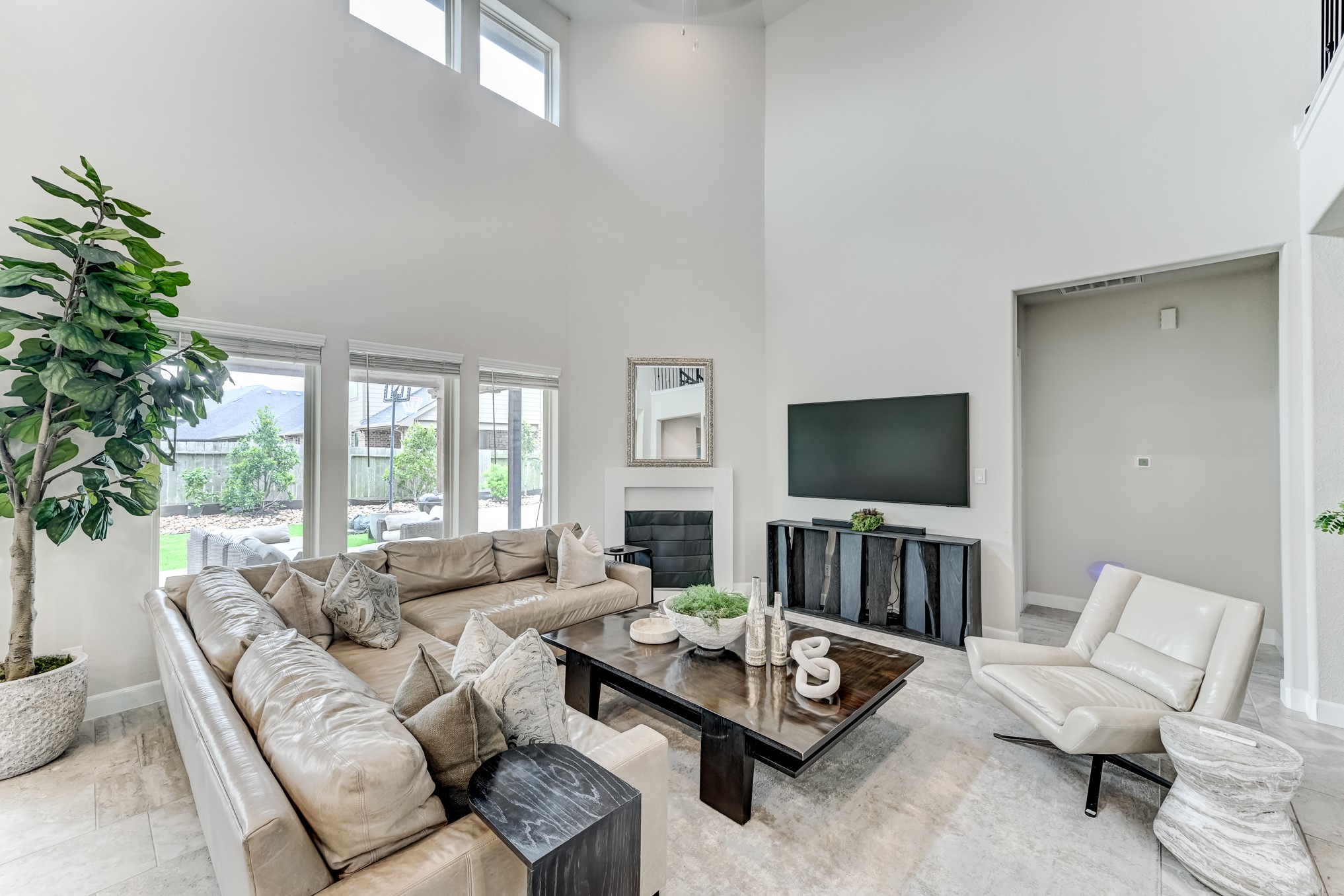 5806 Metaphor Way Rosenberg, TX 77469 - Photo 9 of 50 a living room with furniture and a flat screen tv