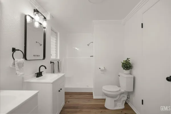 a view of a big room with closet and window