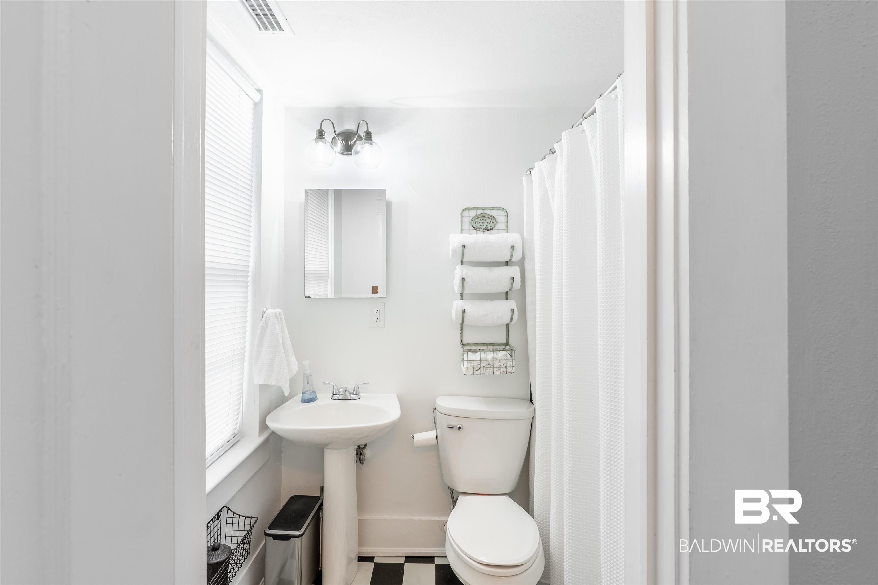 1600 Government Street, Unit 3F Mobile, AL 36604 - Photo 8 of 18 Bathroom with toilet and a sink