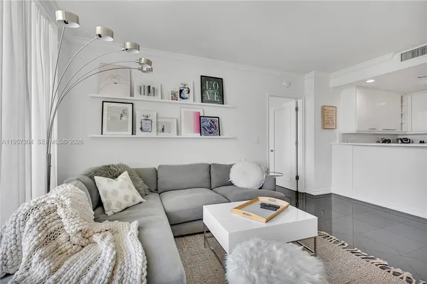 a living room with furniture and a table