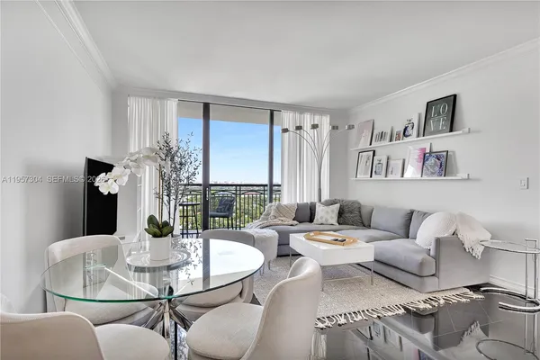 a living room with furniture and a table