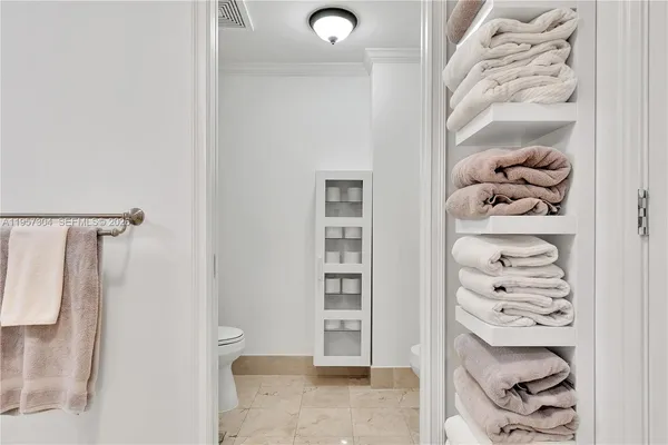 a view of a bathroom with a glass door