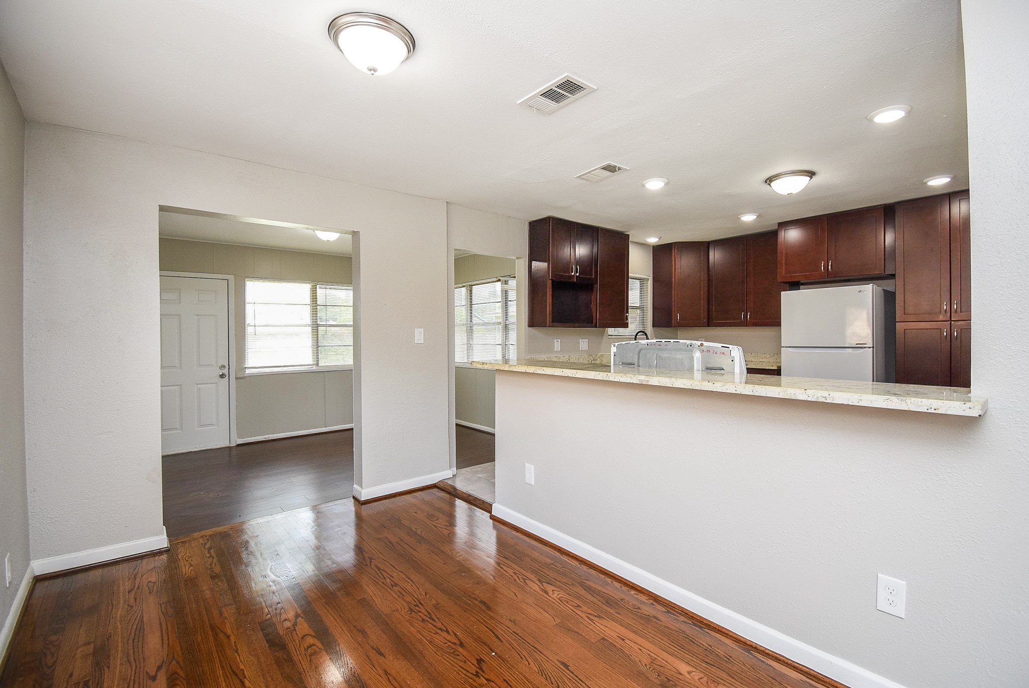 6223 Wayland Street Houston, TX 77021 - Photo 5 of 20 Kitchen opens to living.