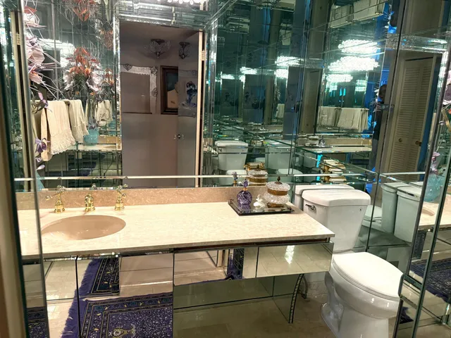 a bathroom with a sink a toilet and tub