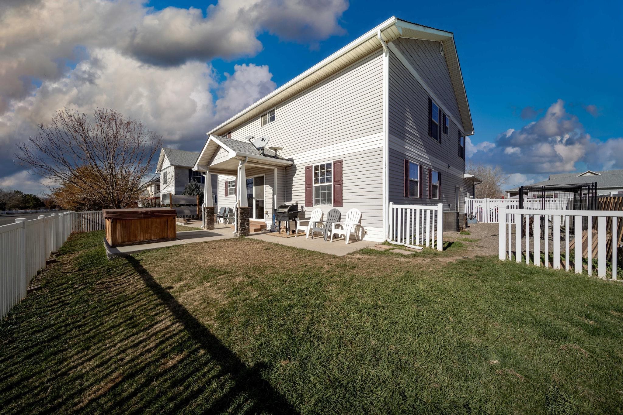 1124 West Addington Lane Fruita, CO 81521 - Photo 23 of 25 a view of a house with backyard