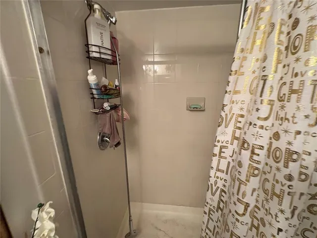 a dining room with furniture and a fireplace