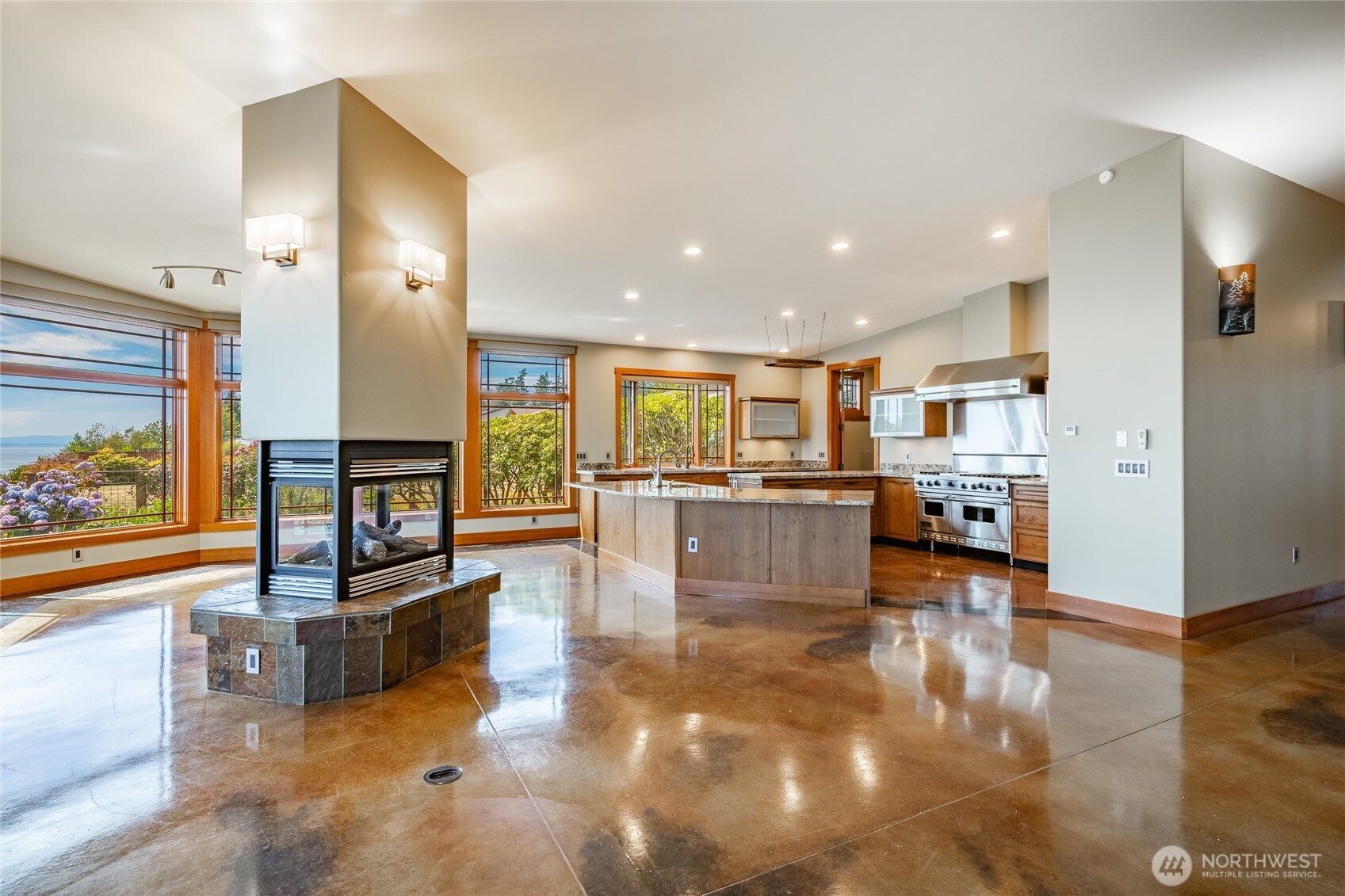 5727 Nakat Way Blaine, WA 98230 - Photo 12 of 40 a living room with stainless steel appliances furniture and a kitchen view