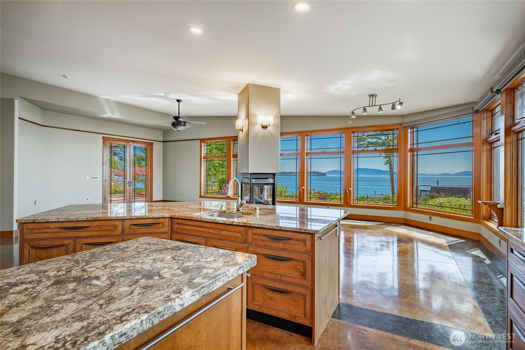 5727 Nakat Way Blaine, WA 98230 - Photo 16 of 40 a kitchen with stainless steel appliances granite countertop a sink and a stove