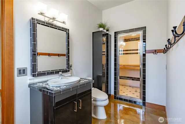 a bathroom with a sink and a mirror