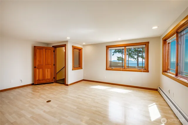 a view of kitchen with stainless steel appliances granite countertop refrigerator sink and stove
