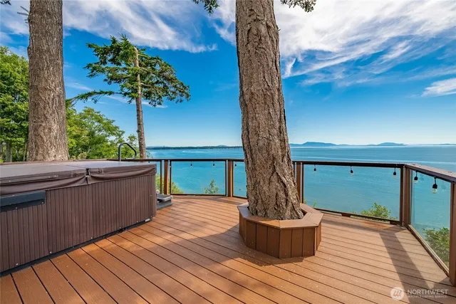 a view of balcony with wooden floor