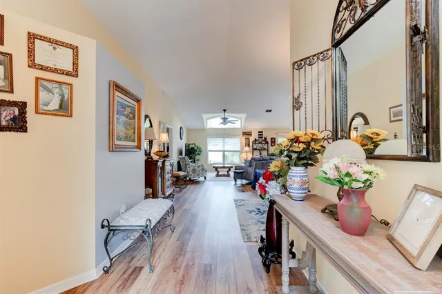 a view of a living room and dining room