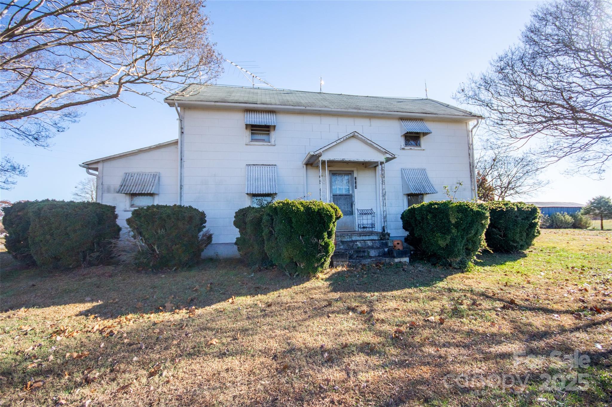 334 Myers Mill Road Statesville, NC 28625 - Photo 22 of 35 a view of a house with a yard covered in snow