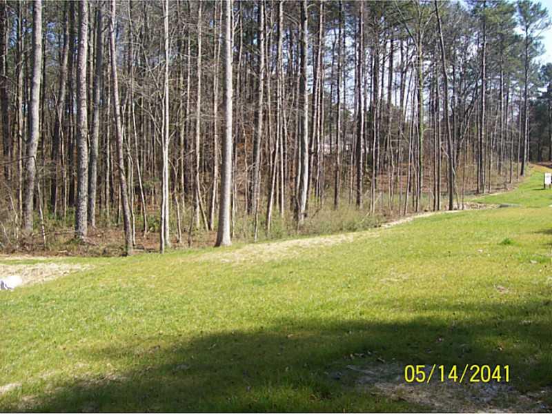 980 Rockbridge Road Southwest Lilburn, GA 30047 - Photo 1 of 1 Exterior Front. Street view of Front of Lot
