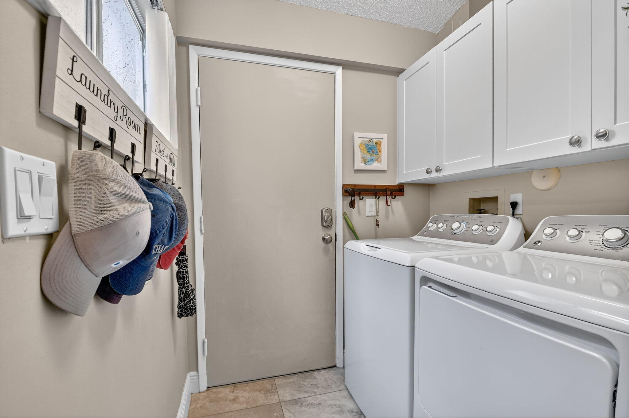 6426 Mill Pointe Circle Delray Beach, FL 33484 - Photo 14 of 57 a utility room with dryer and washer