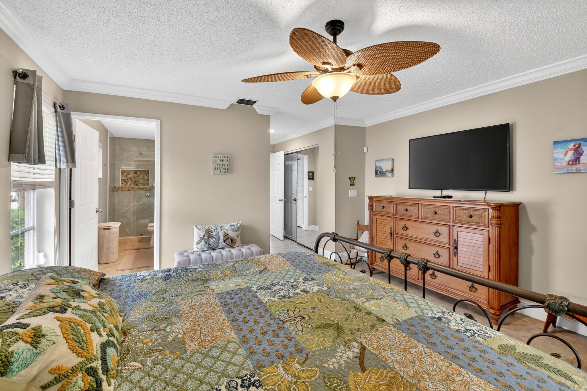 6426 Mill Pointe Circle Delray Beach, FL 33484 - Photo 17 of 57 a bedroom with a bed and a flat screen tv