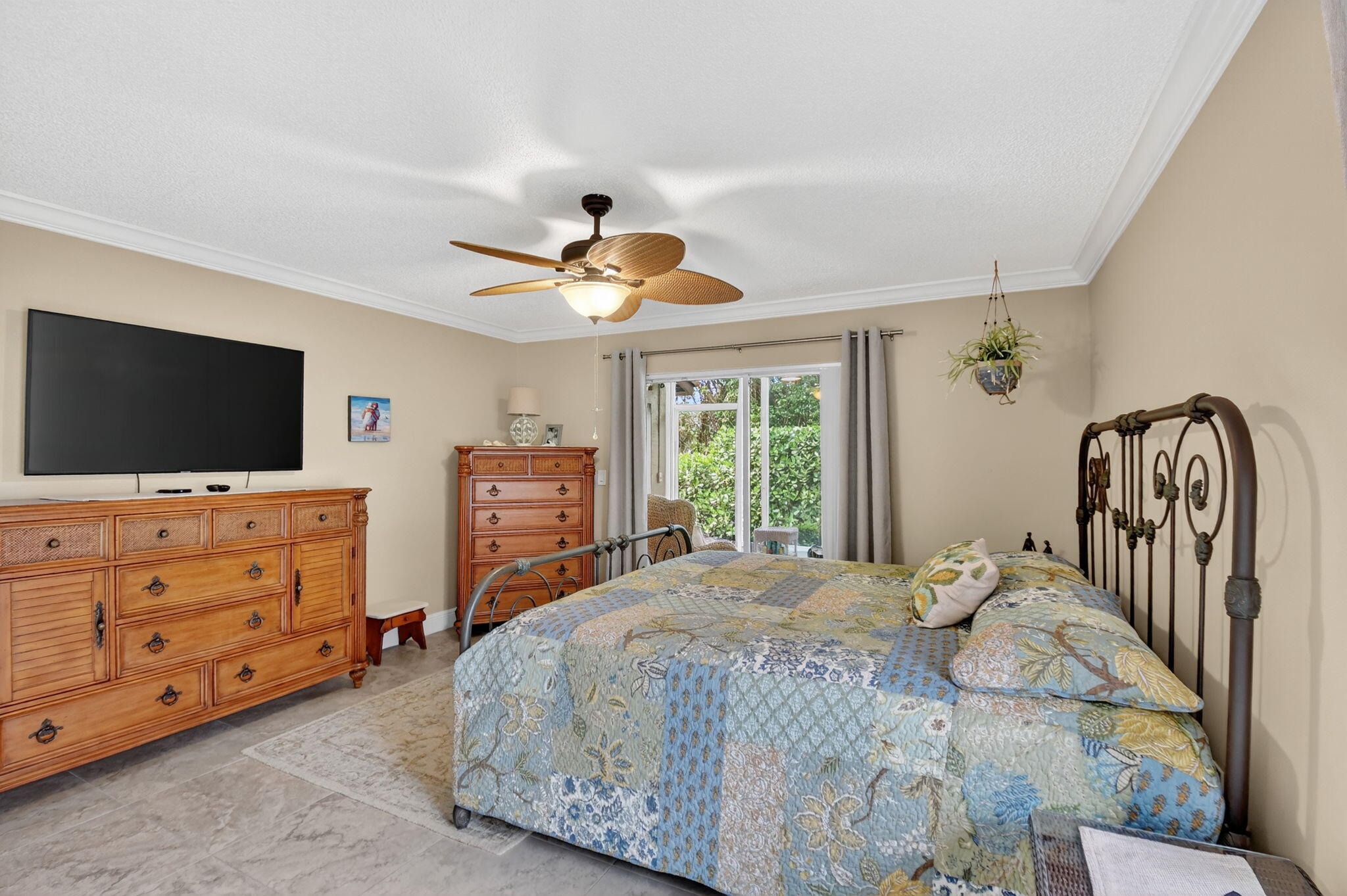 6426 Mill Pointe Circle Delray Beach, FL 33484 - Photo 18 of 57 a bedroom with a bed and a flat screen tv