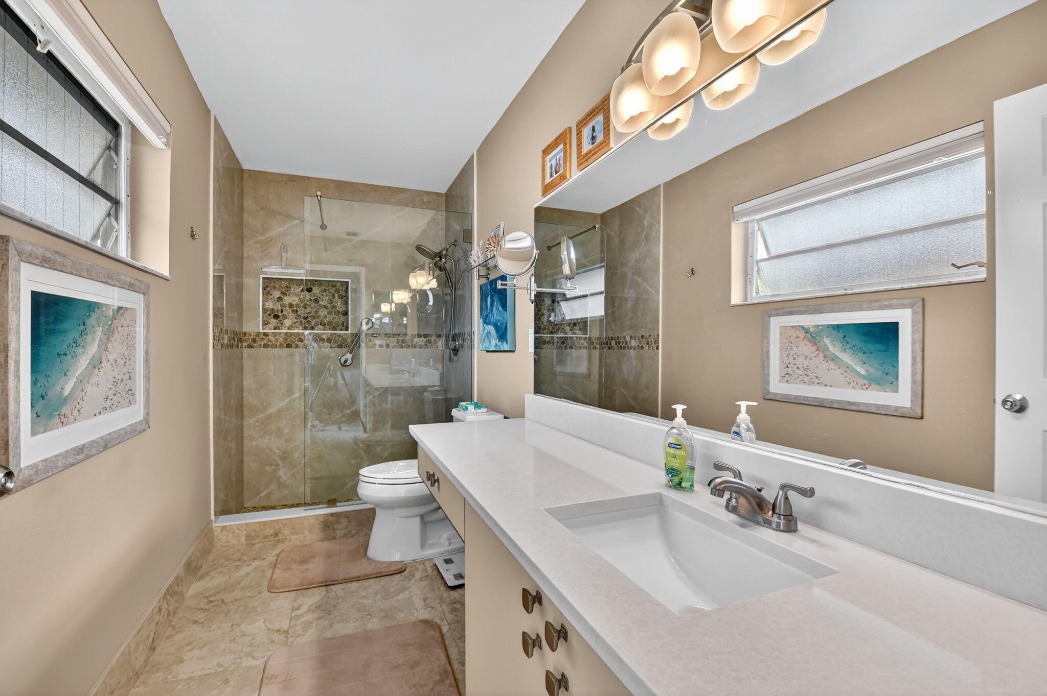 6426 Mill Pointe Circle Delray Beach, FL 33484 - Photo 19 of 57 a bathroom with a double vanity sink toilet and shower