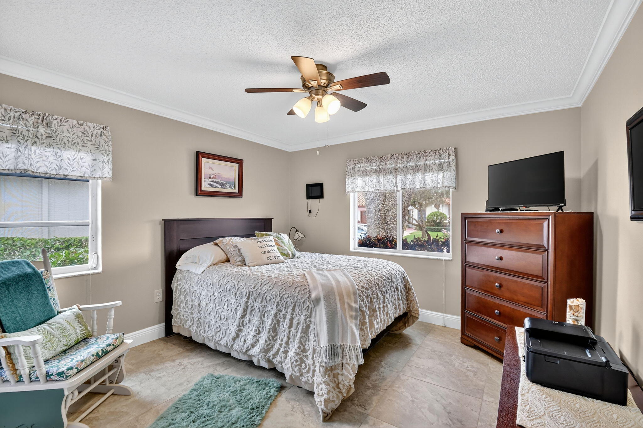 6426 Mill Pointe Circle Delray Beach, FL 33484 - Photo 20 of 57 a bedroom with a bed and a flat screen tv