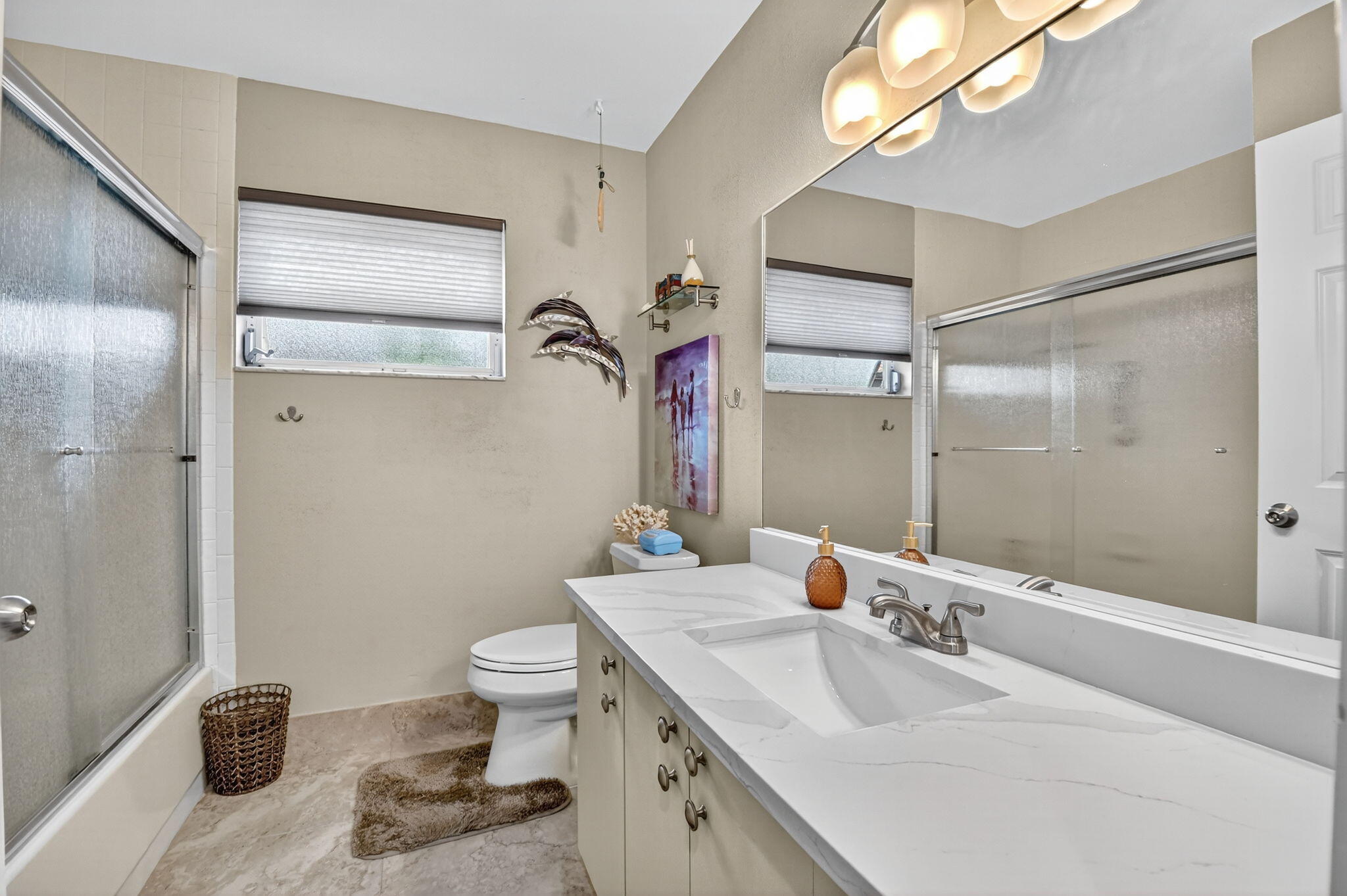 6426 Mill Pointe Circle Delray Beach, FL 33484 - Photo 24 of 57 a bathroom with a double vanity sink toilet and shower