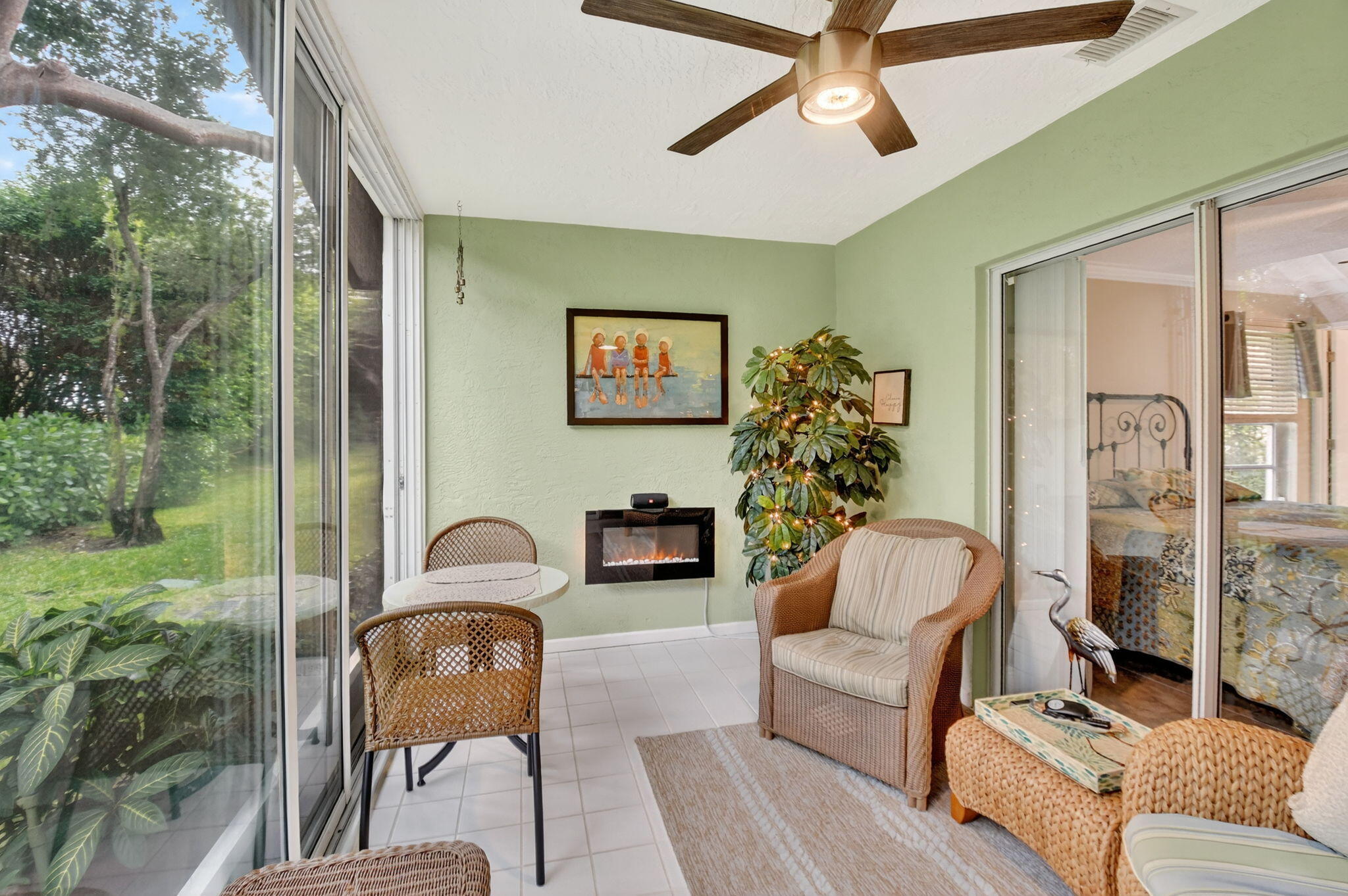 6426 Mill Pointe Circle Delray Beach, FL 33484 - Photo 25 of 57 a living room with furniture and a potted plant