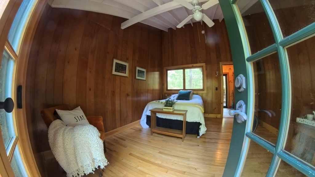 32 Pond Hill Road Goshen, MA 01096 - Photo 5 of 24 a bedroom with furniture and a window