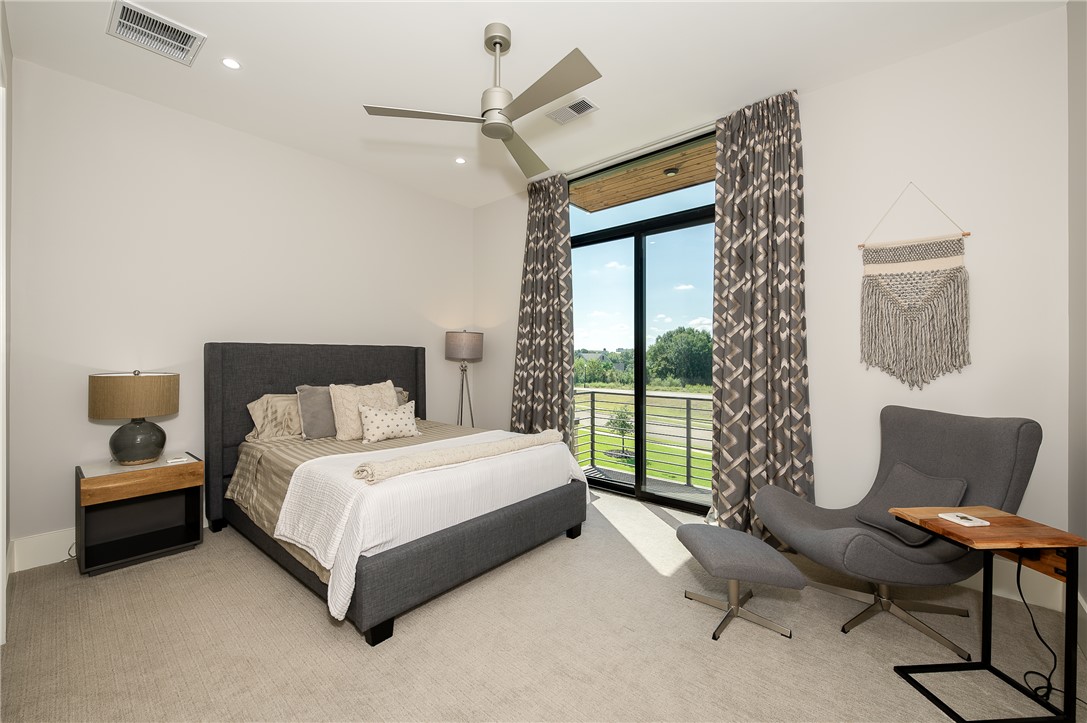 3320 Sycamore Trail Bryan, TX 77807 - Photo 42 of 48 Carpeted bedroom with a ceiling fan, recessed lighting, access to exterior, and visible vents