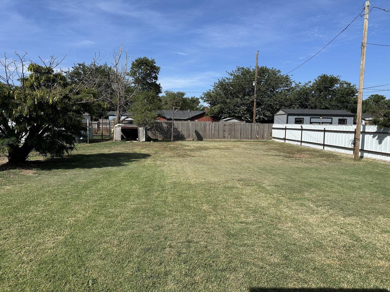 2807 Lexington Street Plainview, TX 79072 - Photo 15 of 16 a view of a yard with an outdoor space