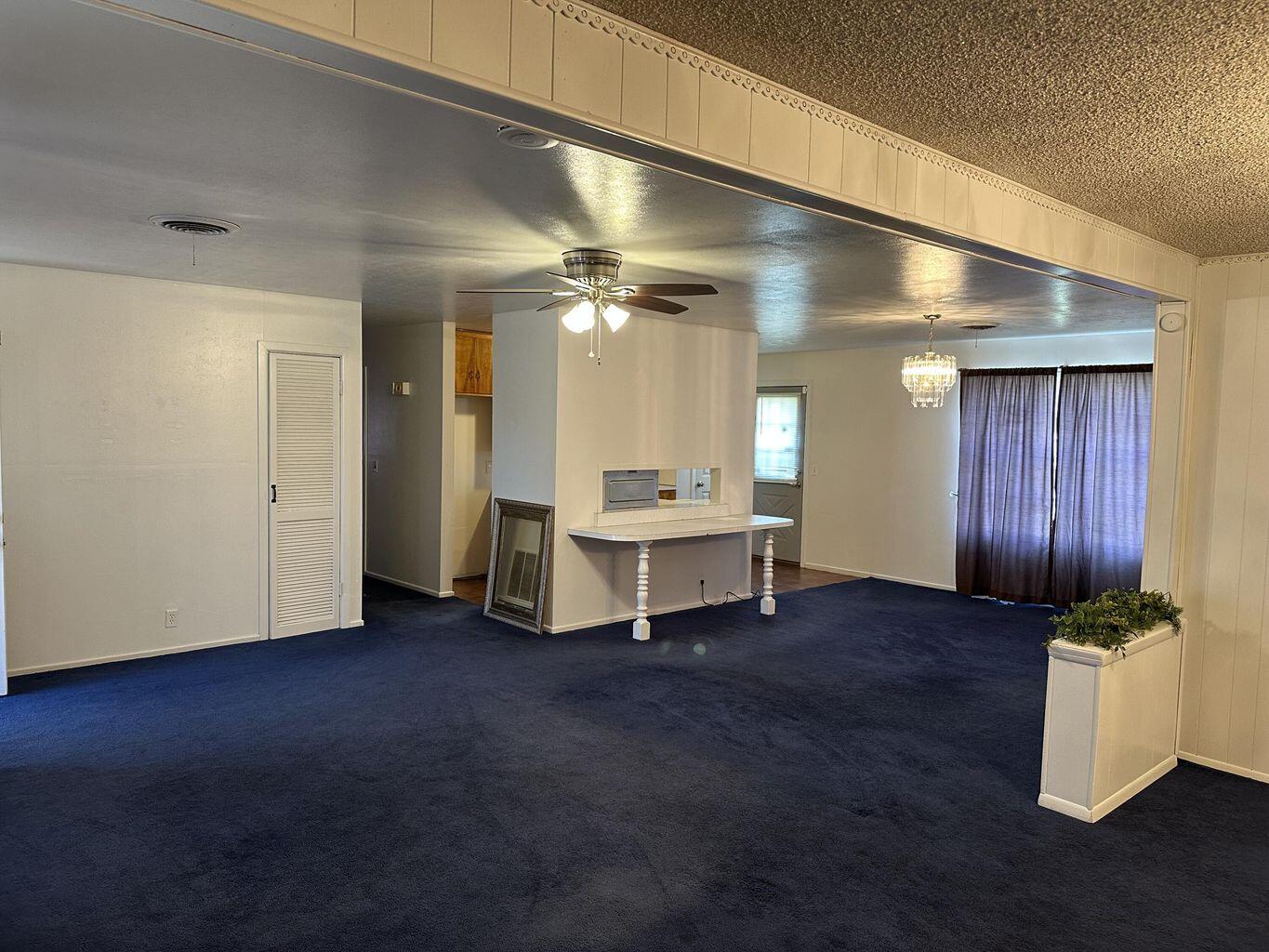 2807 Lexington Street Plainview, TX 79072 - Photo 2 of 16 a view of a room with gym equipment