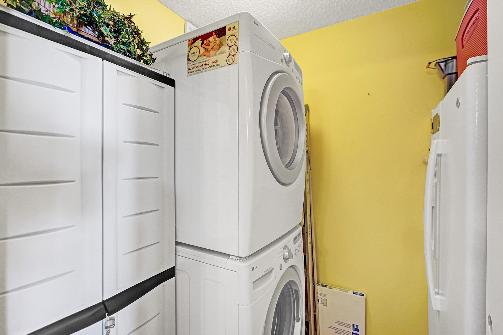 8624 Overset Lane, Unit B Boca Raton, FL 33496 - Photo 13 of 29 a utility room with dryer and washer