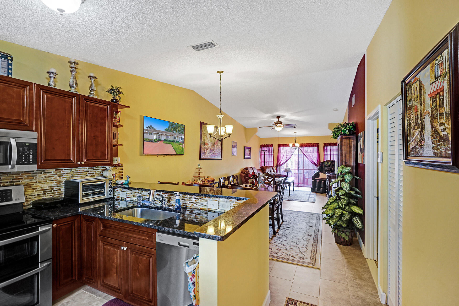 8624 Overset Lane, Unit B Boca Raton, FL 33496 - Photo 20 of 29 a kitchen with lots of counter top space