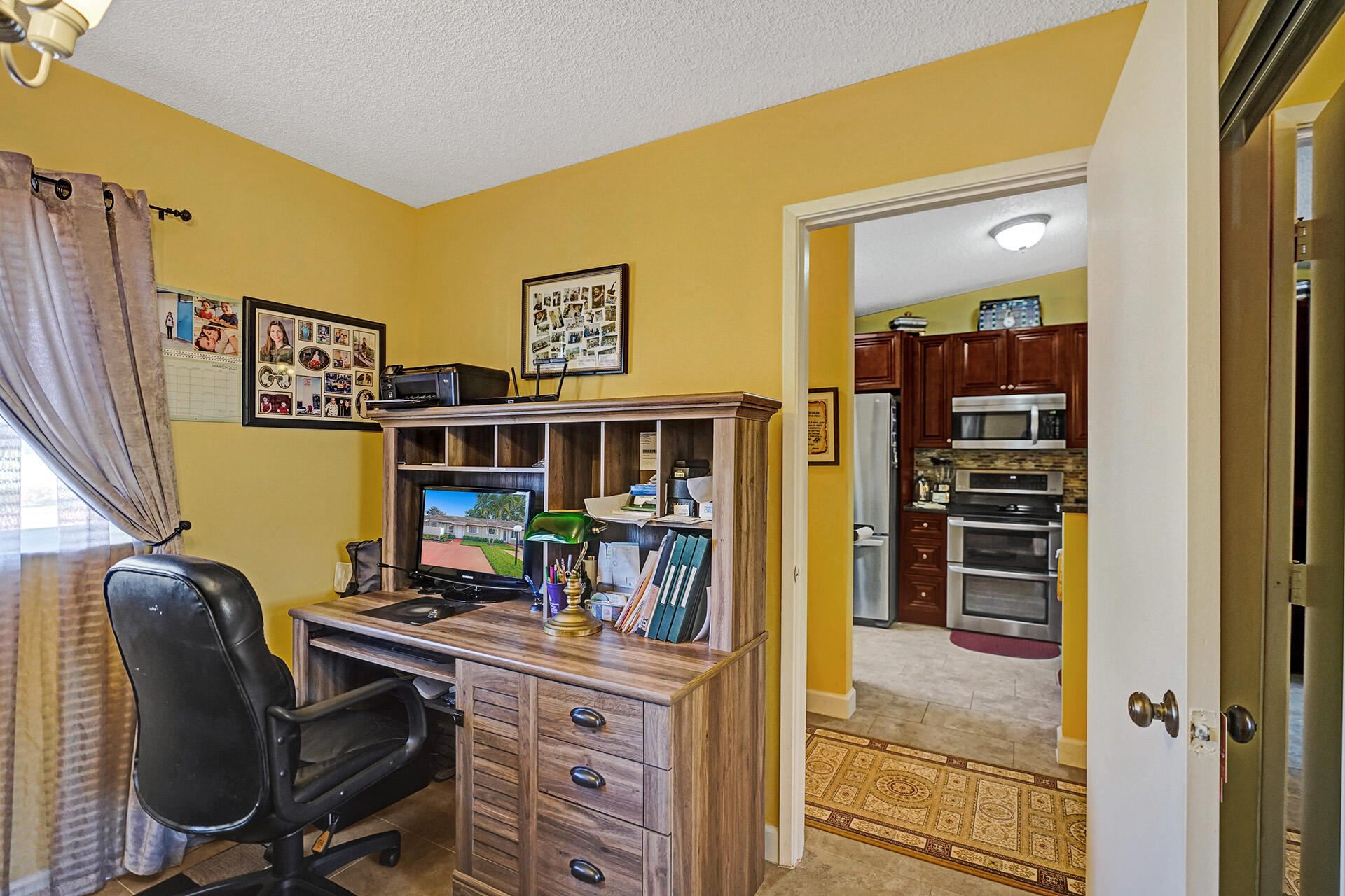 8624 Overset Lane, Unit B Boca Raton, FL 33496 - Photo 23 of 29 a view of a workspace with furniture