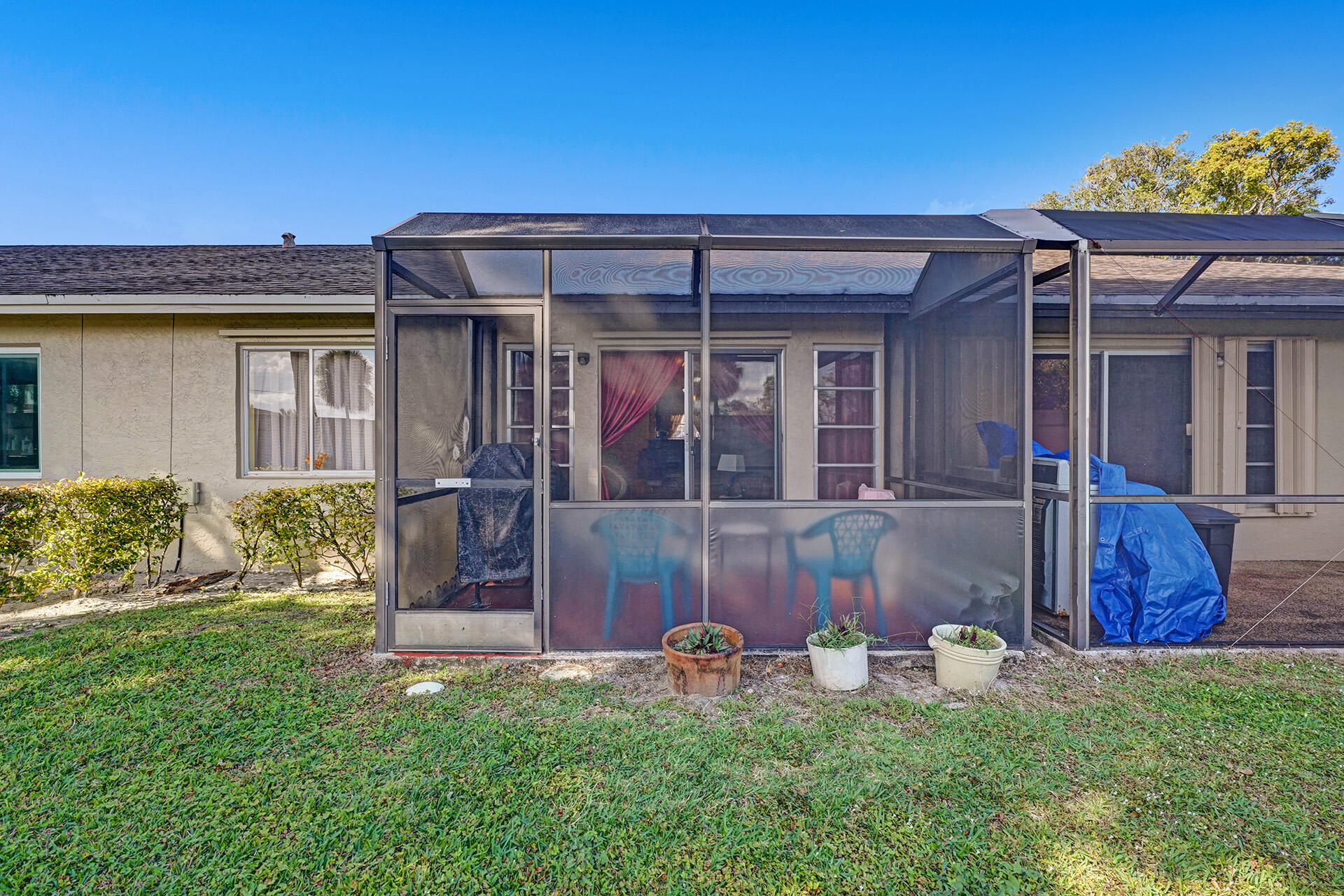 8624 Overset Lane, Unit B Boca Raton, FL 33496 - Photo 26 of 29 front view of a house with a yard