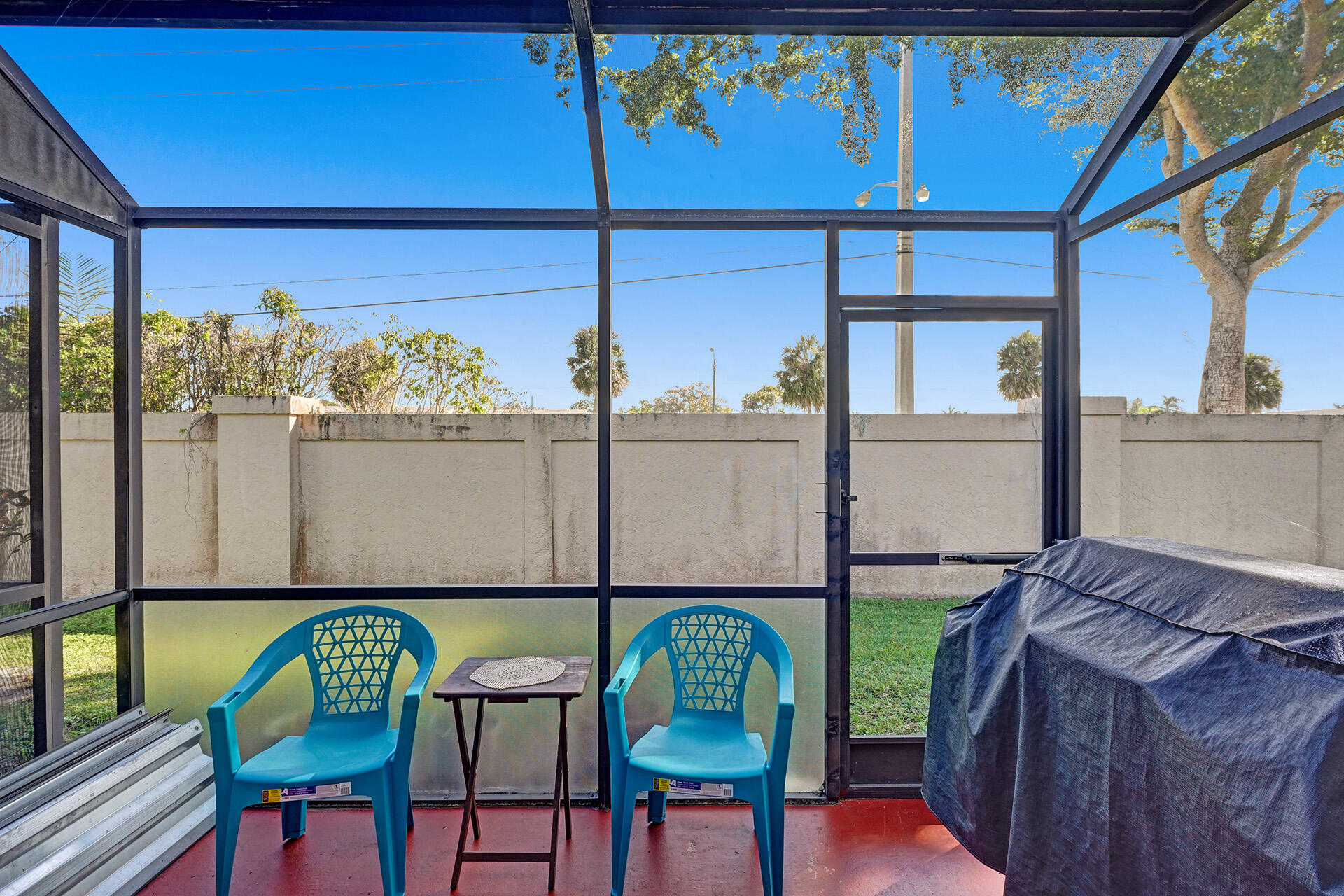 8624 Overset Lane, Unit B Boca Raton, FL 33496 - Photo 28 of 29 a view of a chairs and table in the balcony