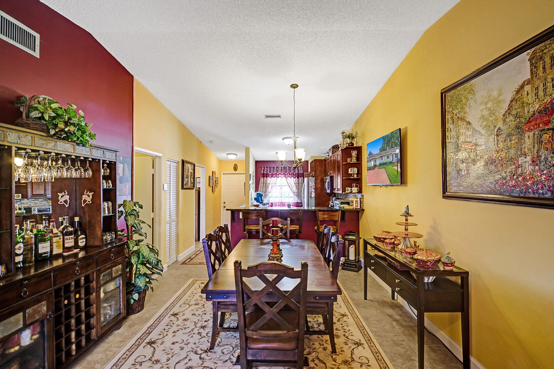 8624 Overset Lane, Unit B Boca Raton, FL 33496 - Photo 8 of 29 a view of a dining room with furniture window and wooden floor