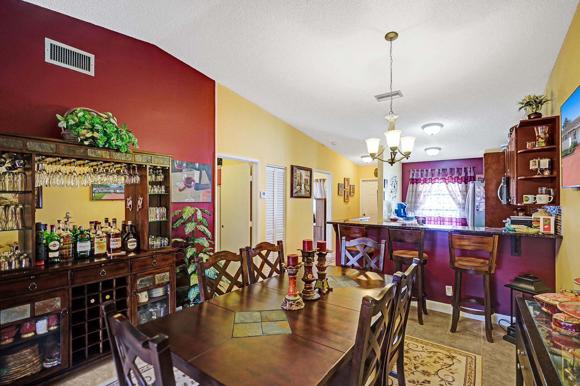 8624 Overset Lane, Unit B Boca Raton, FL 33496 - Photo 9 of 29 a view of a dining room with furniture