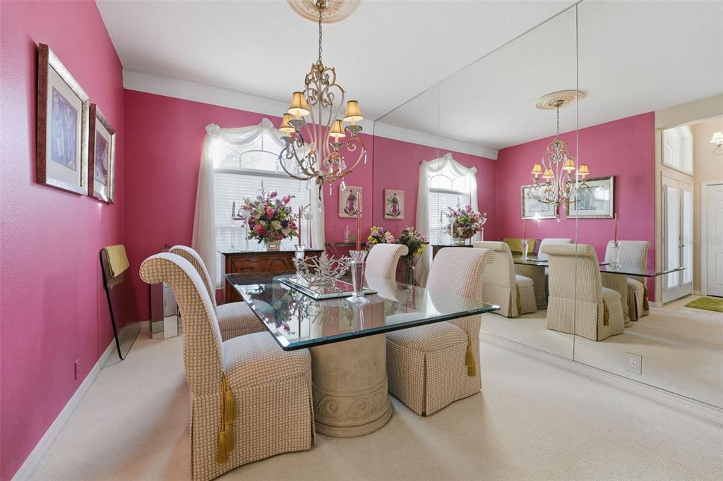 507 Cheval Drive Venice, FL 34292 - Photo 12 of 43 a dining room with furniture and chandelier