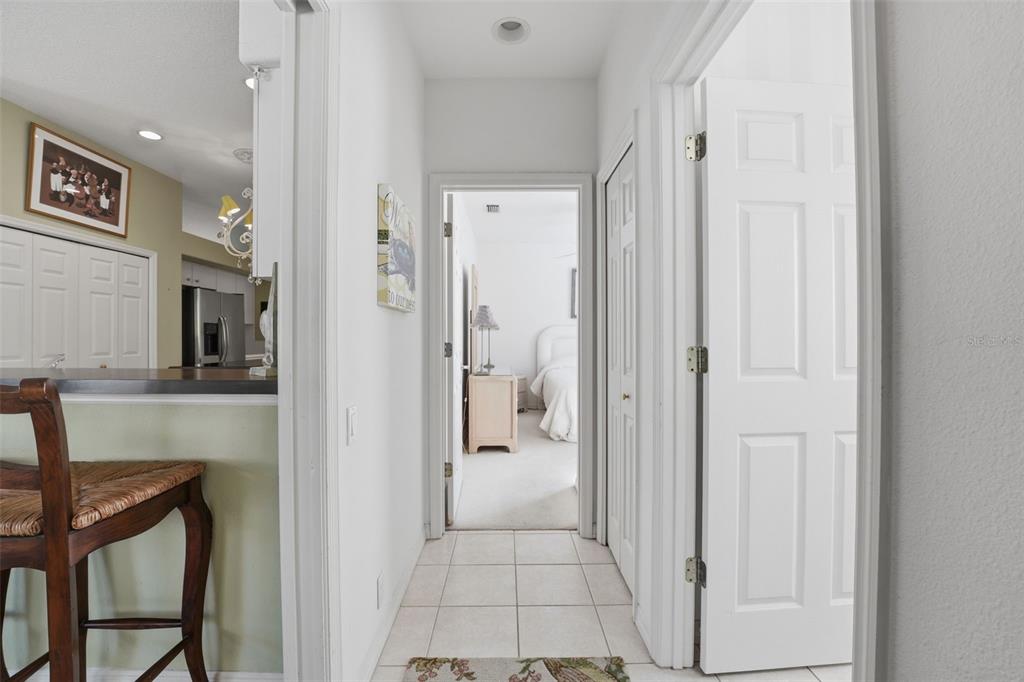 507 Cheval Drive Venice, FL 34292 - Photo 28 of 43 a view of a hallway with wooden shelves