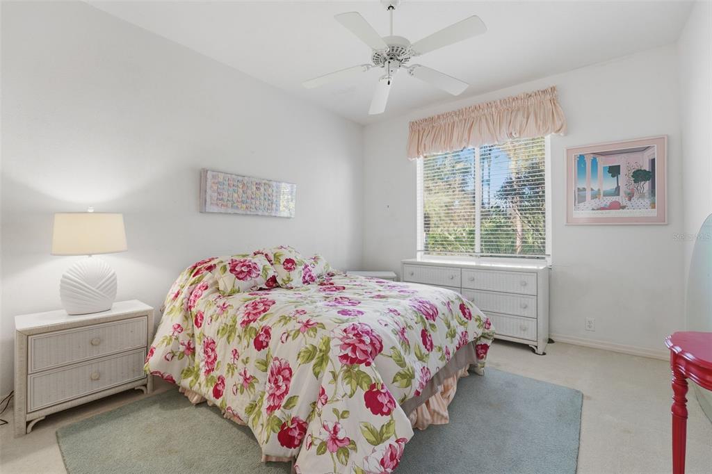 507 Cheval Drive Venice, FL 34292 - Photo 32 of 43 a bedroom with a bed and a window