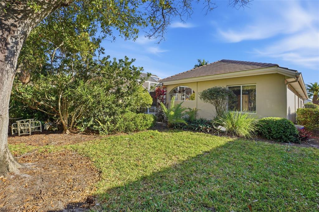 507 Cheval Drive Venice, FL 34292 - Photo 43 of 43 a front view of a house with garden