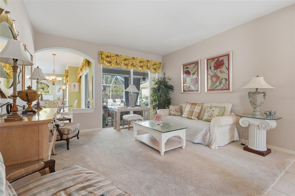 507 Cheval Drive Venice, FL 34292 - Photo 6 of 43 a living room with furniture and a table