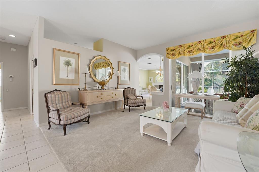 507 Cheval Drive Venice, FL 34292 - Photo 7 of 43 a living room with furniture and a large window