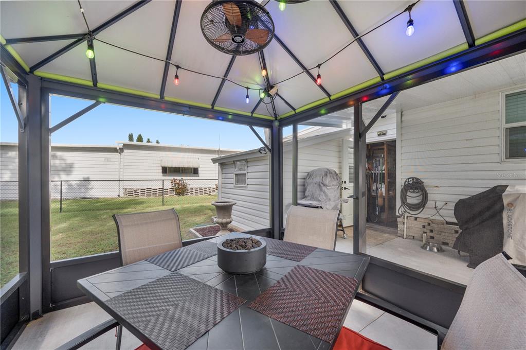 1610 Reynolds Road, Unit 187 Lakeland, FL 33801 - Photo 16 of 20 a view of a dining room with furniture window and outside view