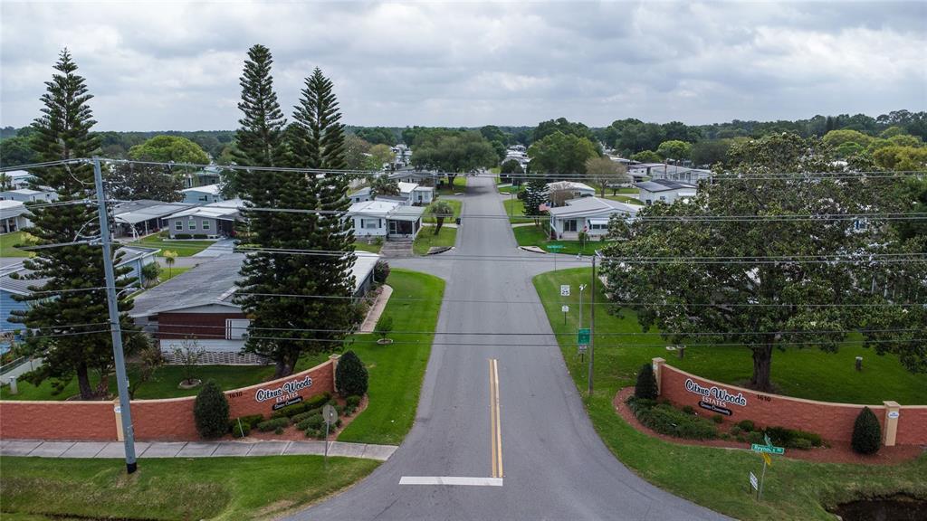 1610 Reynolds Road, Unit 187 Lakeland, FL 33801 - Photo 20 of 20 a view of a garden with lawn chairs