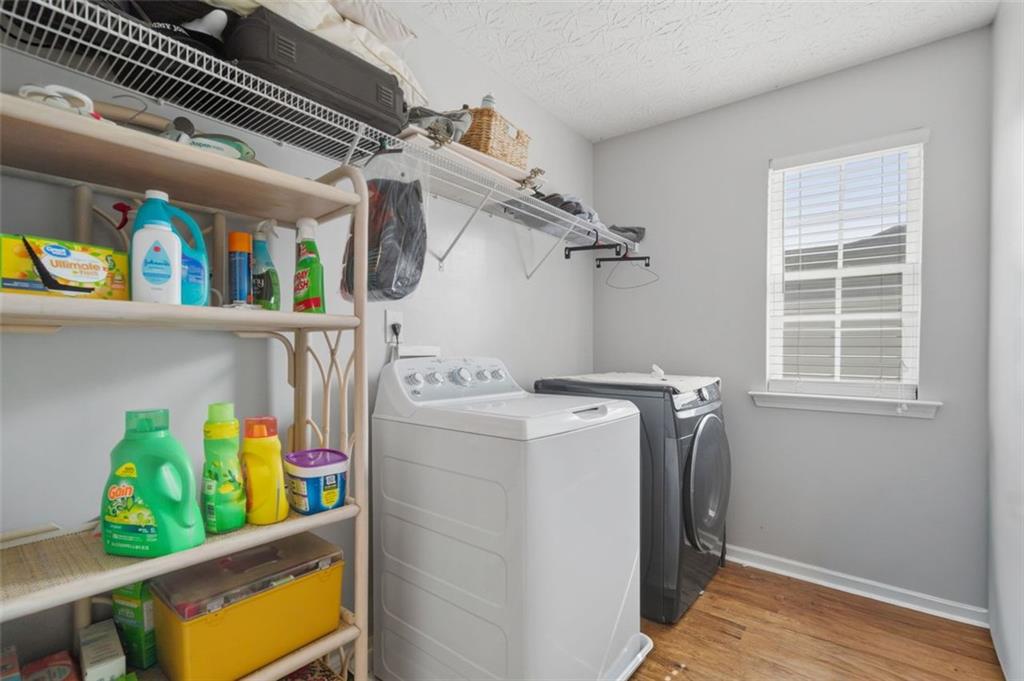 3635 Roseman Landing Cumming, GA 30040 - Photo 20 of 31 a utility room with dryer and washer