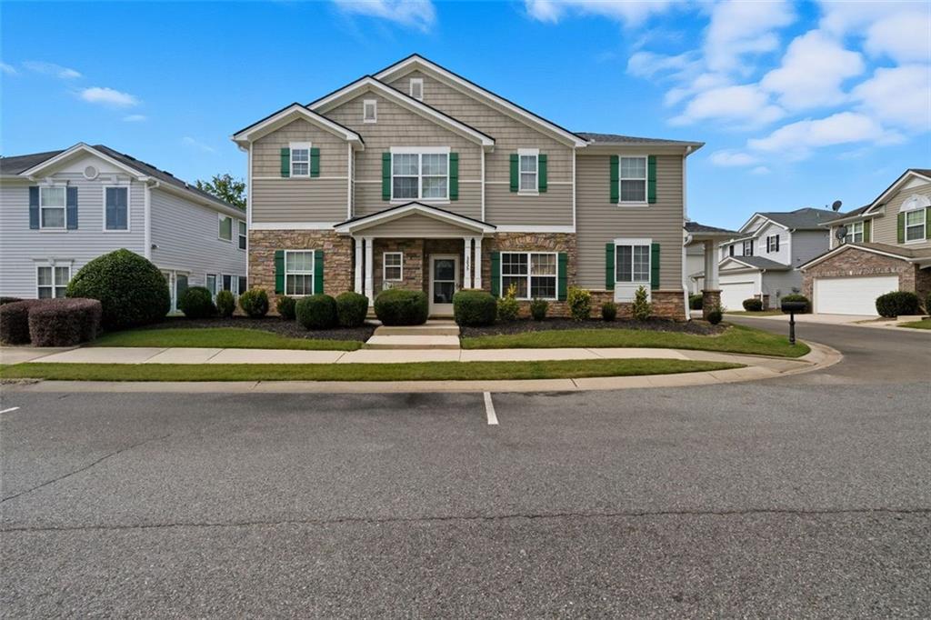 3635 Roseman Landing Cumming, GA 30040 - Photo 2 of 31 a front view of a house with a yard