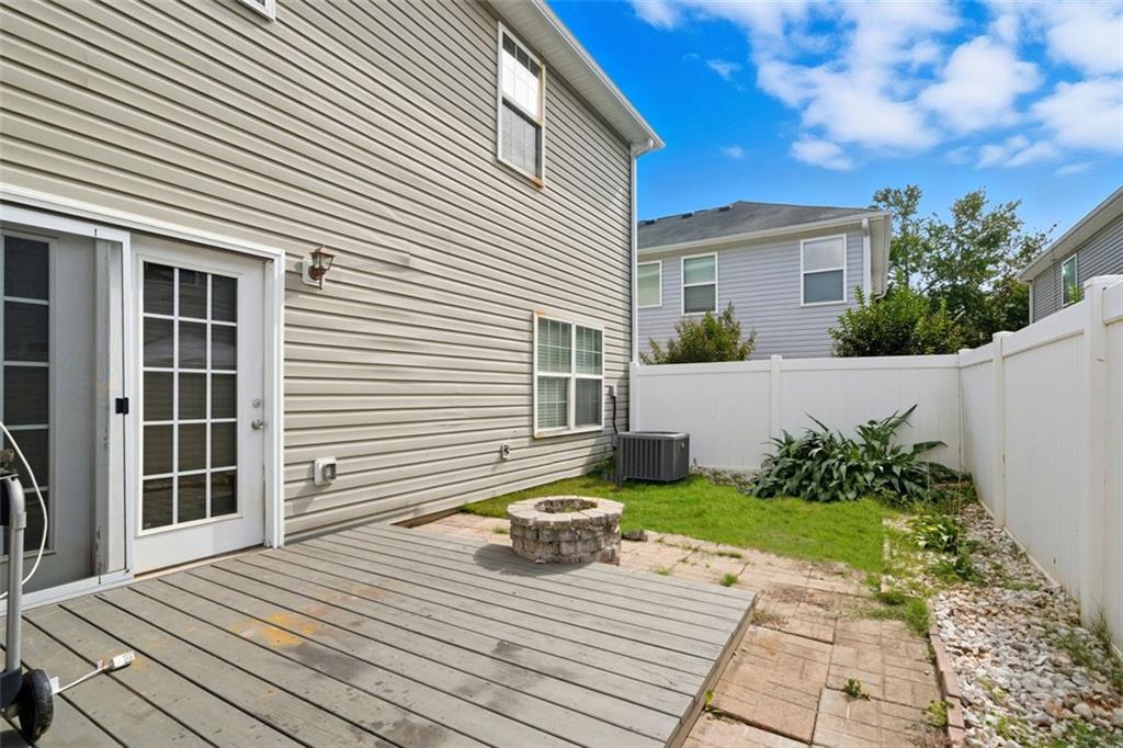 3635 Roseman Landing Cumming, GA 30040 - Photo 23 of 31 a view of a house with sitting area